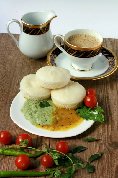 Indian Rice cake with Lentil curry. South Indian Breakfast. Idali Sambar, idli, food