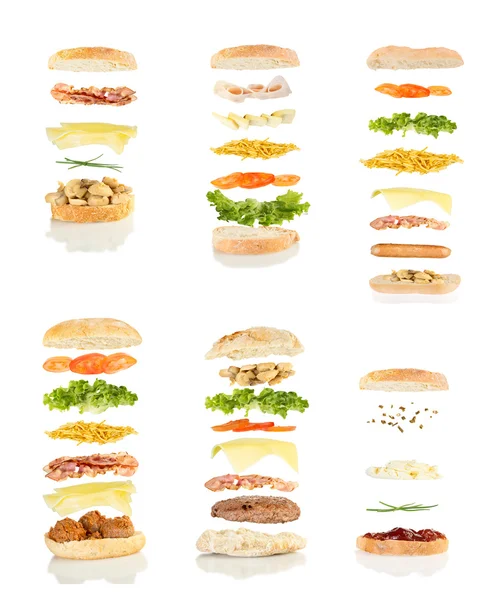 Шість різних бутербродів плавають — стокове фото