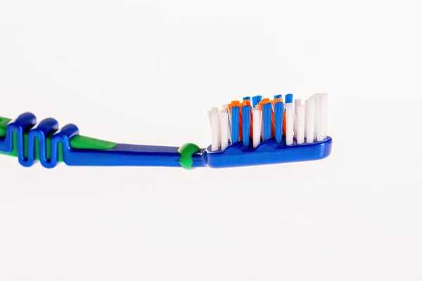 Ny tandbørste - Stock-foto
