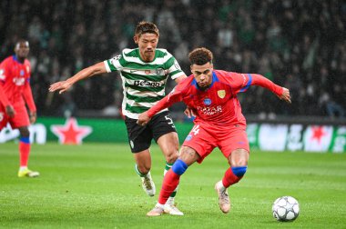 Lizbon, Portekiz. 20 Ocak 2026. Paris Saint Germain 'den Desire Doue, Lizbon' daki Estadio Jose Alvalade 'de UEFA Şampiyonlar Ligi için Paris Saint-Germain' e karşı mücadele ediyor..