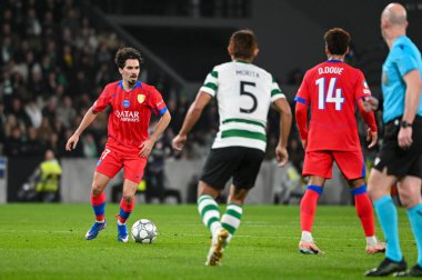 Lizbon, Portekiz. 20 Ocak 2026. Paris 'in Vitinha orta saha oyuncusu Saint Germain, Lizbon' daki Estadio Jose Alvalade 'de UEFA Şampiyonlar Ligi için Paris Saint-Germain' e karşı Sporting CP sırasında görev yapıyor..