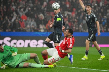 Lizbon, Portekiz. 28 Ocak 2026. SL Benfica forveti Vangelis Pavlidis, Real Madrid 'in Benfica kalecisi Thibaut Courtois' a karşı Lizbon 'da Estadio da Luz' da oynanan UEFA Şampiyonlar Ligi maçında Real Madrid 'e karşı oynadı..