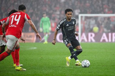 Lizbon, Portekiz. 28 Ocak 2026. Benfica maçında Real Madrid 'den ilerleyen Rodrigo, Lizbon' daki Estadio da Luz 'da oynanan UEFA Şampiyonlar Ligi karşılaşmasında Real Madrid' e karşı mücadele etti..