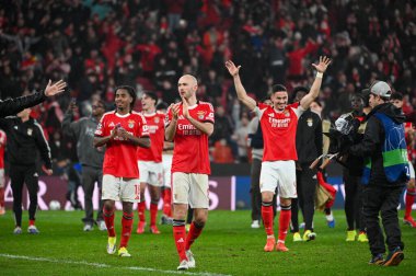 Lizbon, Portekiz. 28 Ocak 2026. SL Benfica 'nın oyuncuları, Lizbon' da Estadio da Luz 'da oynanan UEFA Şampiyonlar Ligi karşılaşmasında Real Madrid' e karşı Benfica 'nın zaferini kutladılar..
