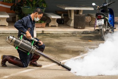 Fogging mosquito to prevent of dengue fever clipart