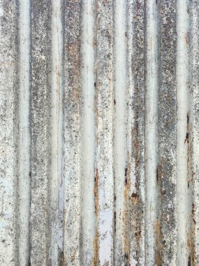 Doku, demir kutunun deseni soyulmuş boya ve pas.