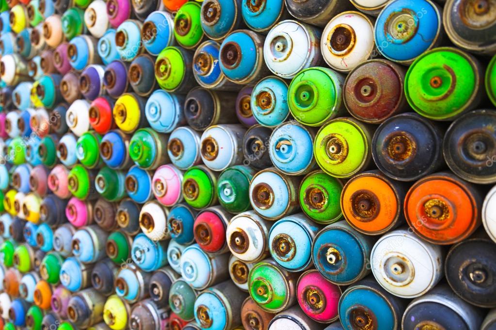 Spray paint dispenser in different colors Stock Photo by ©kopachinsky