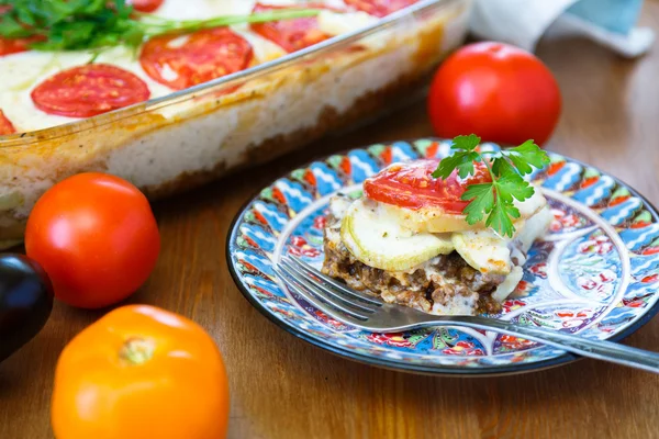 Moussaka dish with aubergine and chili pepper, greek meal — Stockfoto
