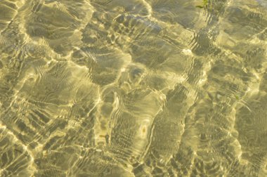 Güneş ışınları su kum. 