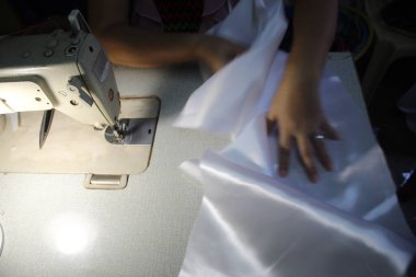 Saflık Elleri Dikiş Üreticisinde