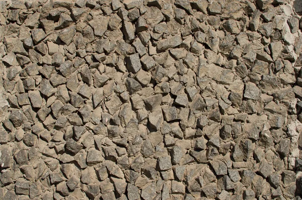 Wall made of gravel. Stone — Stock Photo, Image