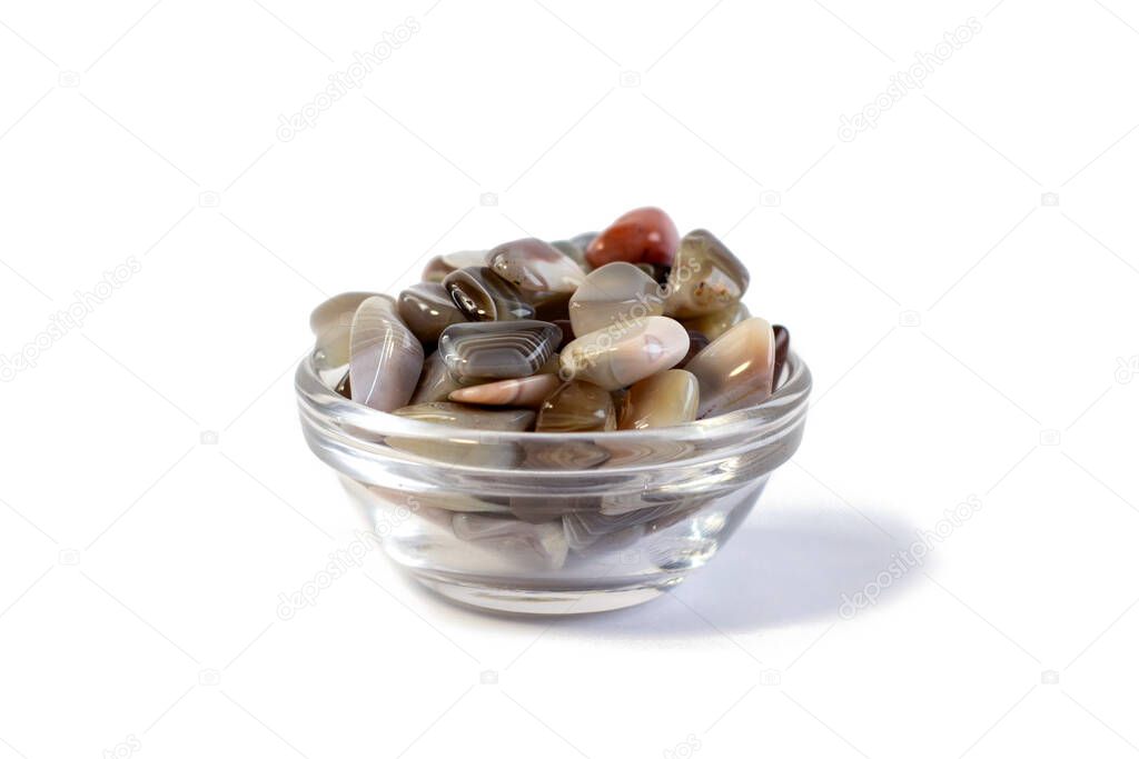 Natural Agate in small bowl, various types and color, gems mineral collection as nice natural background