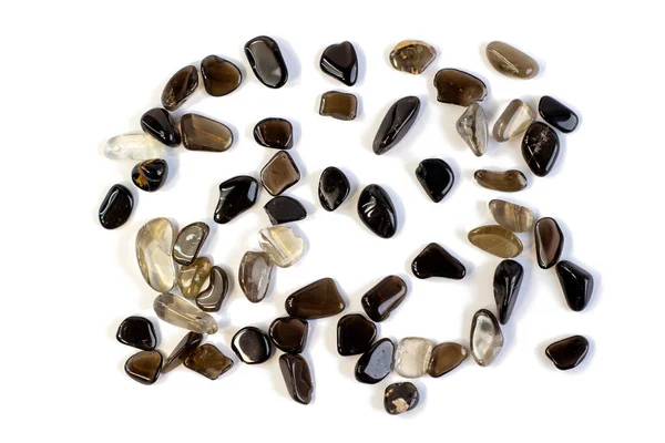 Macro tiro de colección conjunto de roca natural de morión, piedras minerales de gema de cuarzo ahumado aislado sobre fondo blanco — Foto de Stock