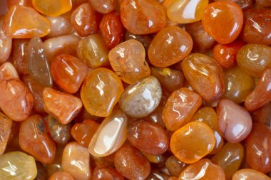 Kornelian jeot taşı güzel bir arka plan. Güzel doğal kristal taş. Üst görüntüyü kapat. Kısmen odaklan.