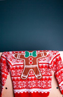 Noel kartı, Noel süveteri ve mum.