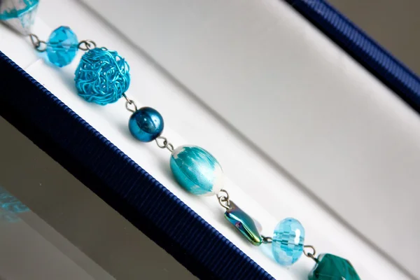 Handmade jewelry and keychains with colorful glass beads — Stock Photo, Image