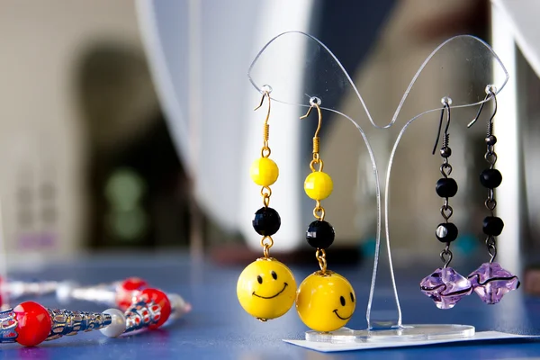 Handmade jewelry and keychains with colorful glass beads — Stock Photo, Image