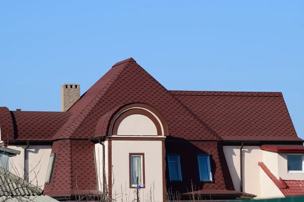 Decorative metal tile on a roof — Stock Photo, Image