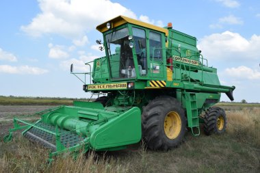 Russia, Poltavskaya village - September 6, 2015: Combine harvesters Don. Agricultural machinery clipart