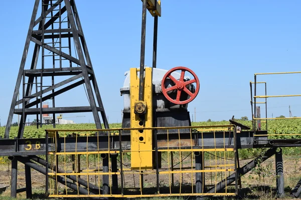The pumping unit as the oil pump installed on a well — Stock Photo, Image
