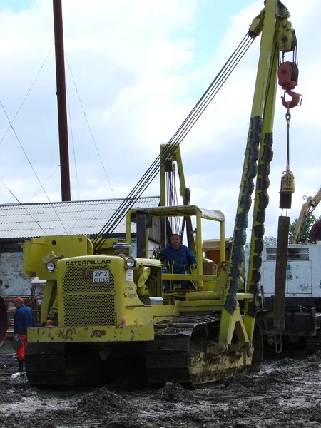 Catarpillar con la grúa. Equipos para obras de construcción . — Foto de Stock