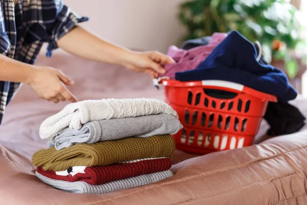 Woman Hands Folding Clothes Bedroom Taking Red Laundry Box — Zdjęcie stockowe