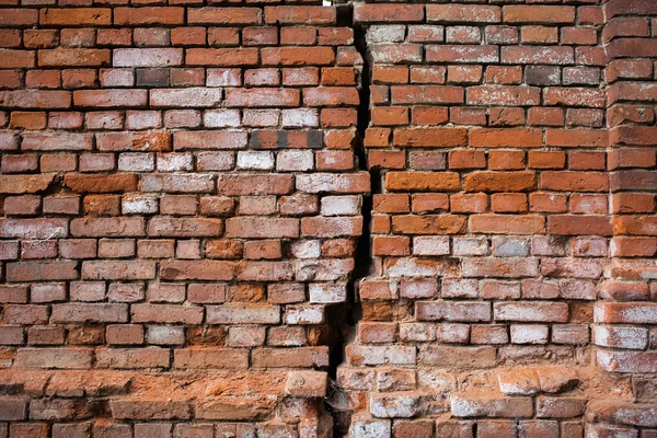 Old vintage brick wall with crack — Stock Photo, Image