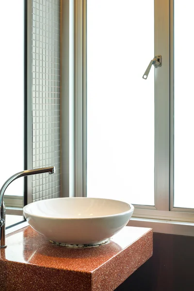 White wash basin with steel faucet in empty bathroom — Stock Photo, Image