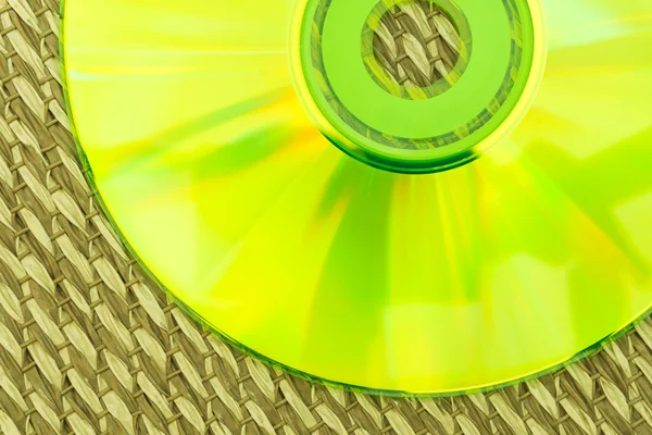 Half Green CD Placed on a Japanese Mat — Stock Photo, Image