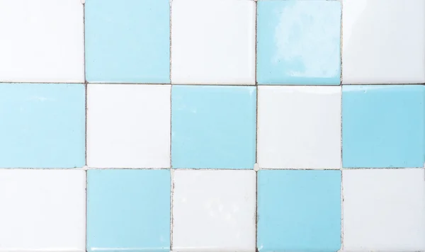 White and Blue Restroom Tile Wall with Chess Pattern