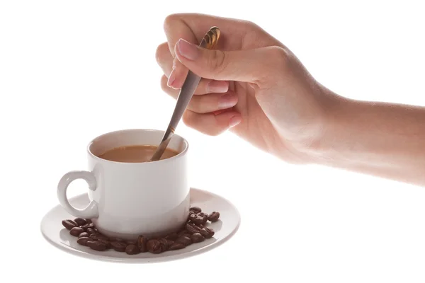 Kaşıklı bir fincan kahve.