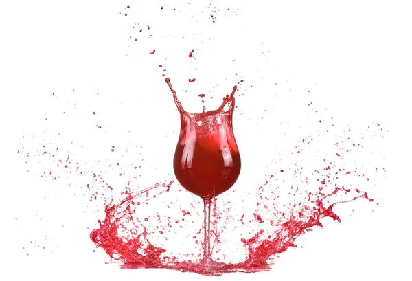 Glass with red wine, red wine splash, wine pouring on table isolated on white background, big splash around — Stock Photo, Image