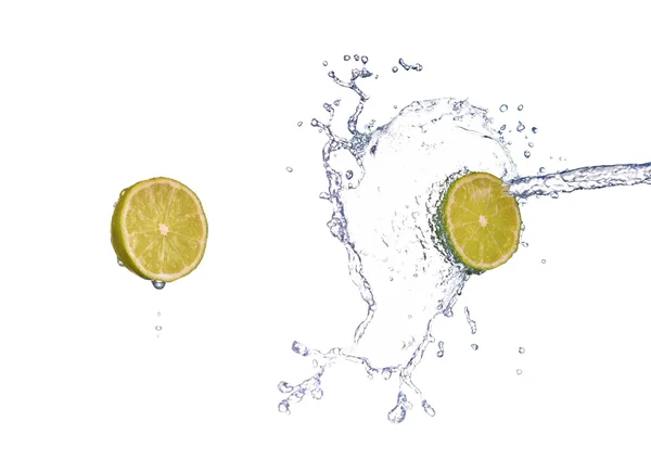 Lime in spray of water. lime cucumber with splash on background — Stock Photo, Image