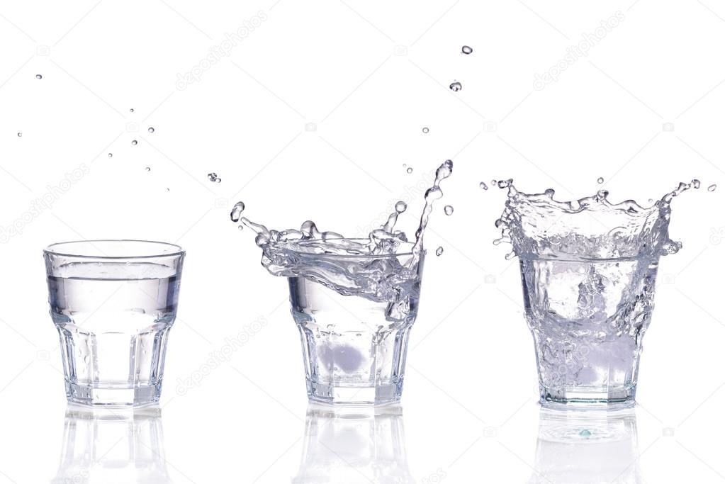 Set of Fresh water splash in a glass isolated on white background