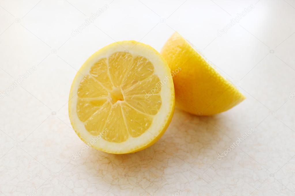 The cut lemon on a kitchen counter — Stock Photo © rafandynka1 ...