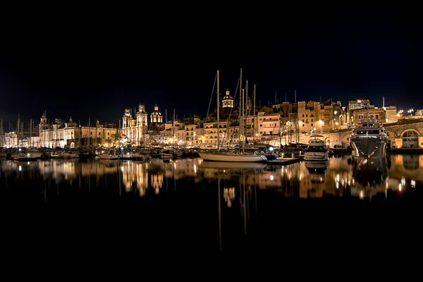 Silhouette and night reflections of the Valletta.Malta