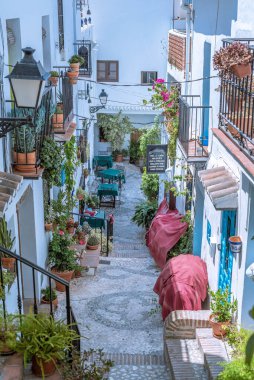 Streets of the white town of Frigiliana, Malaga, Spain clipart