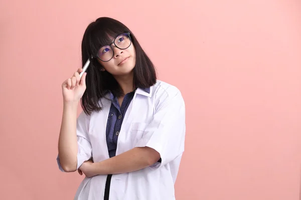 Asian scientist holding pen thinking — Stock Photo, Image