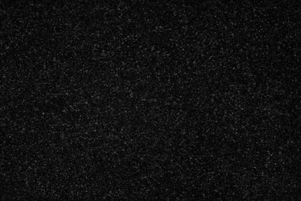 Black  color granules texture background