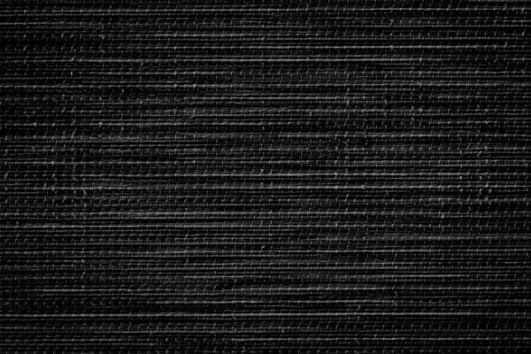 Black fabric texture background. Detail of canvas textile material.