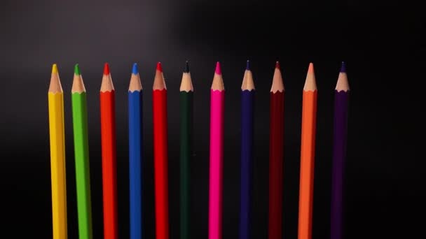 Colored Pencils Black Background Slow Motion Footage — Stock Video