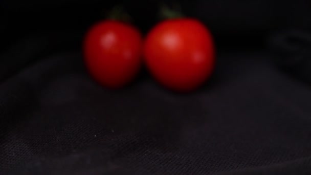 Cherry Tomatoes Water Drops Black Background — Stock Video