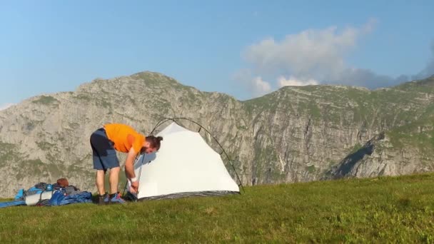 Hiker Sets Blue Tent High Mountain Summer — Stock Video