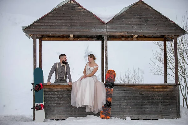 Bride Sits Wooden House Wedding Dress Groom Next Her Snowboards Stock Photo