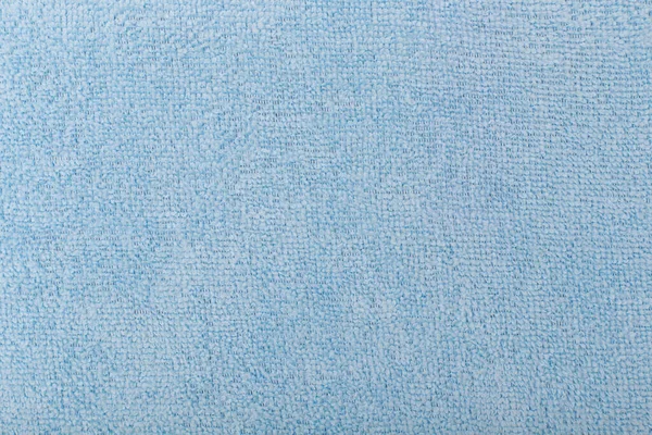 Blue fleecy fabric background. Top view of bright blue fiber. — Stock Photo, Image