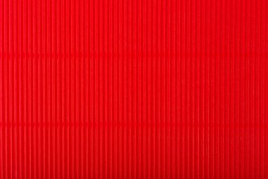 Dikey çizgilerle soyut kırmızı arkaplan. Kopya alanı ile desenli arkaplan. Corrugated paper top lay, web sitesi veya pankart tasarımı için şablon kavramı