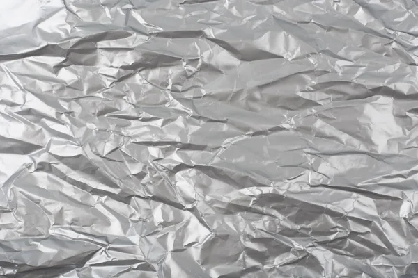 Абстрактный глянцевый серебряный фон с копировальным пространством — стоковое фото