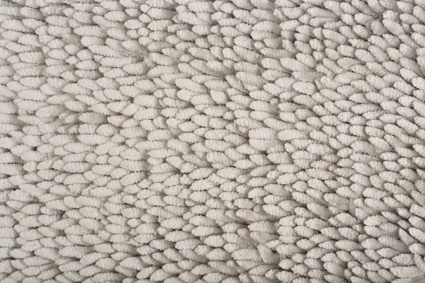 Gri tüylü halı ya da banyo paspası fotokopi alanı ile kapatın. Doğal pamuk mikrofiber kumaş arkaplanı