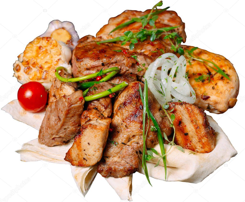 Barbecue meat with onions, pita bread and herbs isolated on a white background