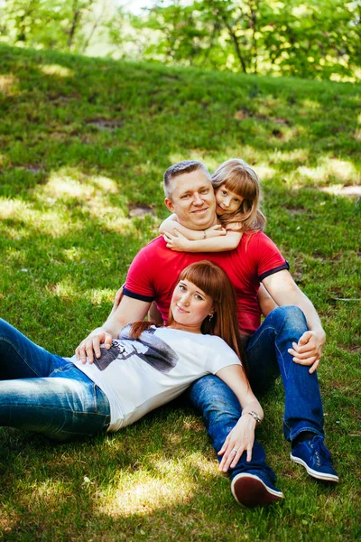 A young family, a pregnant mother, father, daughter — Stock Photo, Image